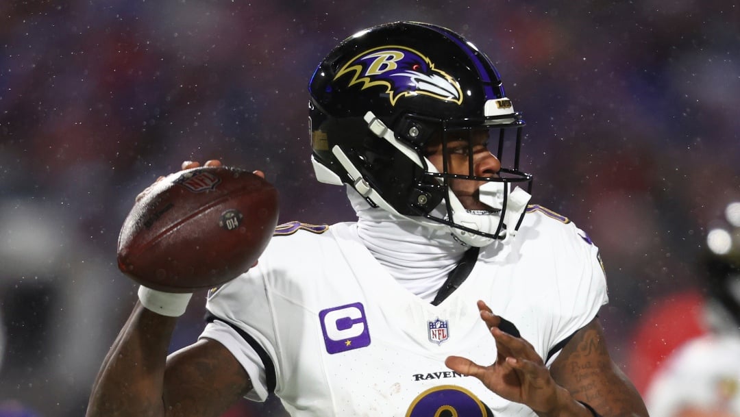 FILE - Baltimore Ravens quarterback Lamar Jackson (8) looks to pass the ball during the first half of an NFL football divisional playoff game against the Buffalo Bills in Orchard Park, N.Y., Jan. 19, 2025. (AP Photo/ Jeffrey T. Barnes, File)