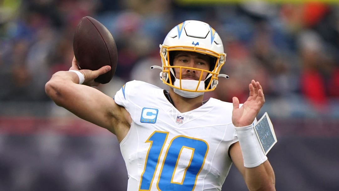 Los Angeles Chargers quarterback Justin Herbert (10) during an NFL football game against the New England Patriots, Saturday, Dec. 28, 2024 in Foxborough, Mass. The Chargers defeated the Patriots 40-7. (AP Photo/Vera Nieuwenhuis)