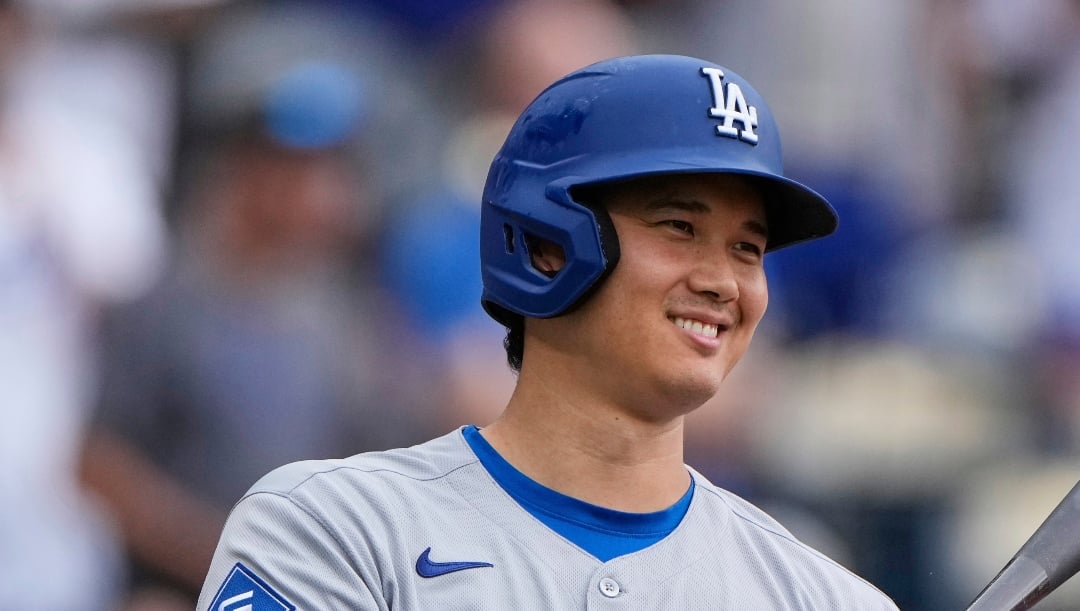 Los Angeles Dodgers' Shohei Ohtani waits to bat during the first inning of a baseball game against the Kansas City Royals, Sunday, June 29, 2025, in Kansas City, Mo. (AP Photo/Charlie Riedel)
