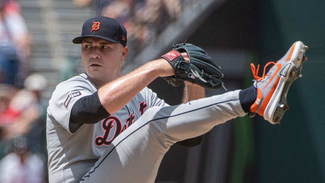 Detroit Tigers starting pitcher Tarik Skubal winds up to throw during the first inning of a baseball game against the Cleveland Guardians, Sunday, July 6, 2025, in Cleveland. (AP Photo/Phil Long)