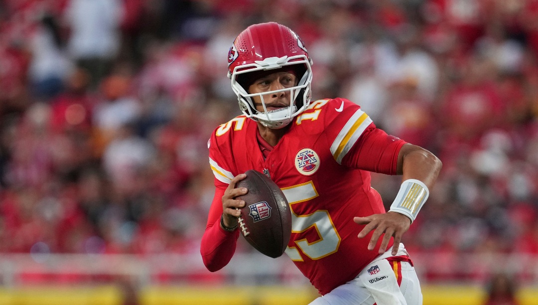 Kansas City Chiefs quarterback Patrick Mahomes looks to pass during the first half of an NFL preseason football game against the Chicago Bears Friday, Aug. 22, 2025, in Kansas City, Mo. (AP Photo/Ed Zurga)