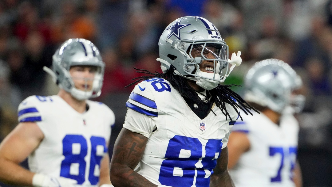 Dallas Cowboys wide receiver CeeDee Lamb (88) jogs to the sideline after making a catch inthe first half of an NFL football game against the Tampa Bay Buccaneers in Arlington, Texas, Sunday, Dec. 22, 2024. (AP Photo/Jeffrey McWhorter)