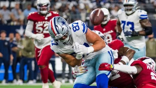 Dallas Cowboys tight end Jake Ferguson (87) is tackled by Arizona Cardinals cornerback Garrett Williams during an NFL football game, Monday, Nov. 3, 2025, Arlington, Texas. (AP Photo/Jessica Tobias)