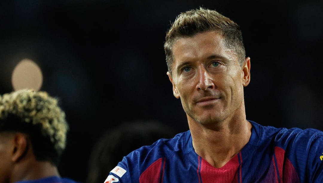 Barcelona's Robert Lewandowski celebrates scoring his side's 2nd goal during a Spanish La Liga soccer match between FC Barcelona and Real Sociedad at the Lluis Companys Olympic Stadium in Barcelona, Spain, Sunday, Sept. 28, 2025. (AP Photo/Joan Monfort)