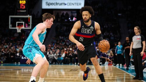 Cade Cunningham #2 of the Detroit Pistons drives by Kon Knueppel #7 of the Charlotte Hornets during the first half of a basketball game at Spectrum Center on February 09, 2026 in Charlotte, North Carolina